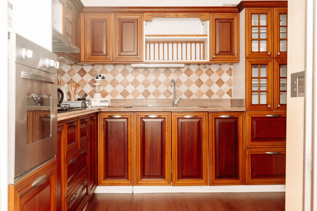 Cabinet Refinishing vs. Replacement: Which Is Best for Your Kitchen? 3 cabinet painting service